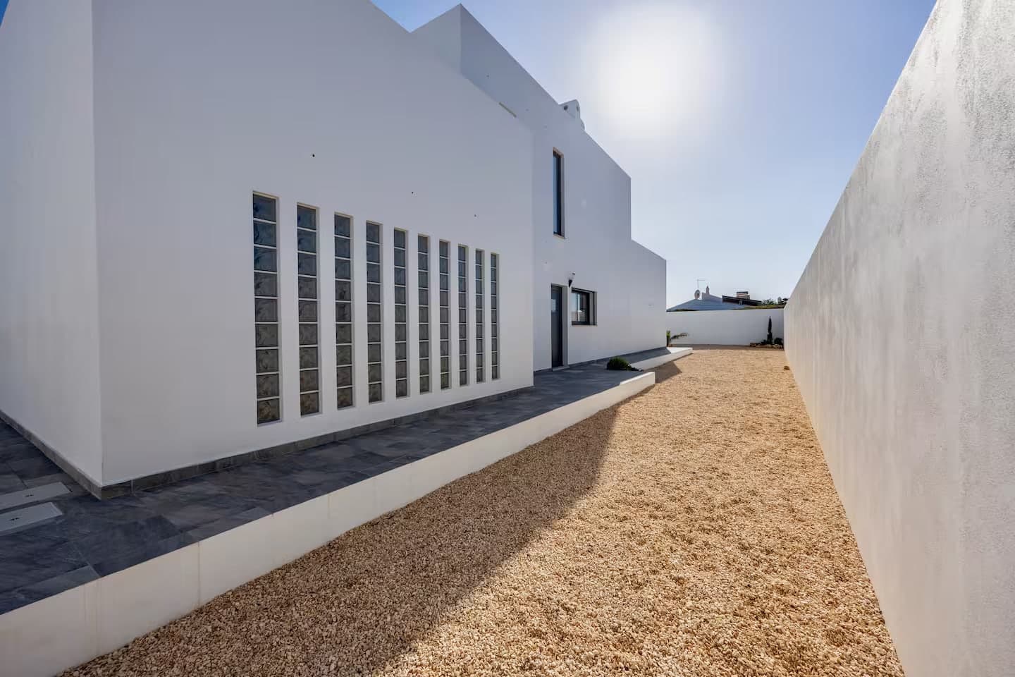 Side outdoor passage behind the villa